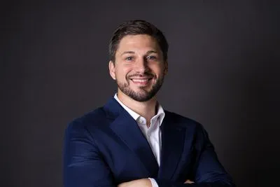 Team member headshot with consistent branding