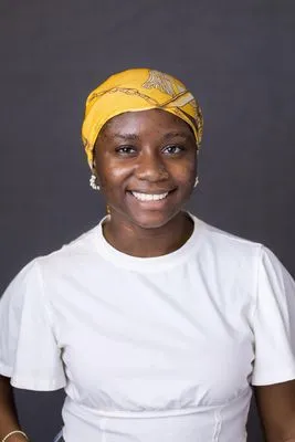 Teen headshot with warm expression