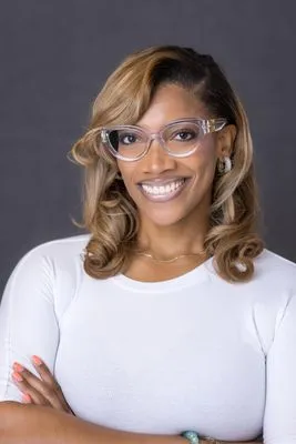 Professional business headshot with confident expression