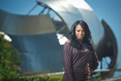 On-location portrait with urban backdrop