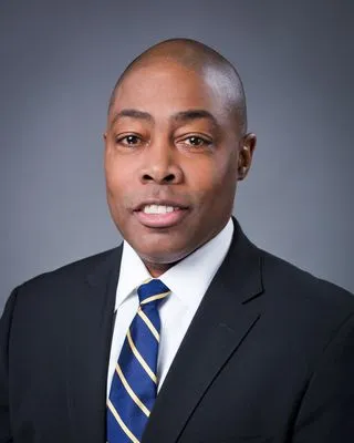 Executive portrait in suit with studio lighting