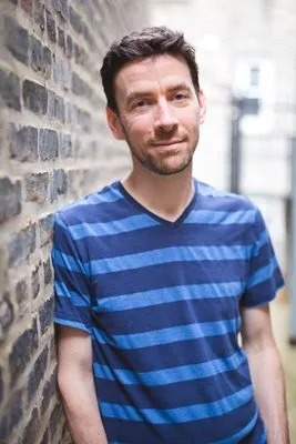 Male actor headshot outdoors urban Chicago