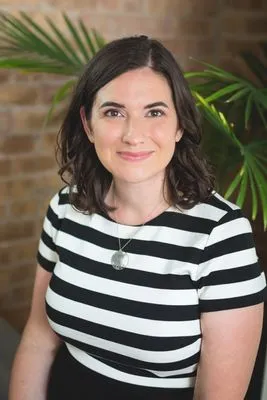 Environmental portrait in warm indoor space