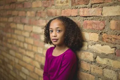 Environmental headshot with city architecture