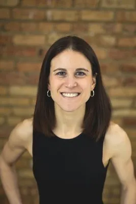 Candid performer portrait in warm indoor setting
