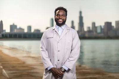 Doctor headshot outdoors with natural lighting