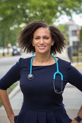 Female physician headshot with stethoscope