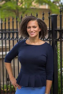 Outdoor professional headshot in city environment