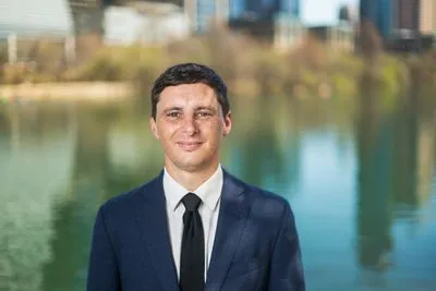 Environmental portrait on city sidewalk