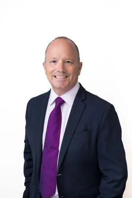 Senior executive in formal attire