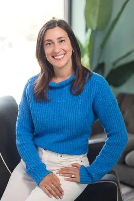 Candid performer headshot in warm setting